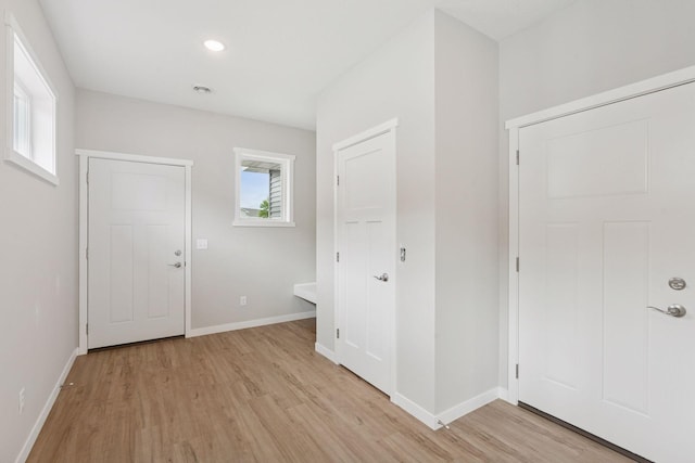 2728 229th Ln NW, Saint Francis, MN 55070 - entryway with light wood finished floors and recessed lighting