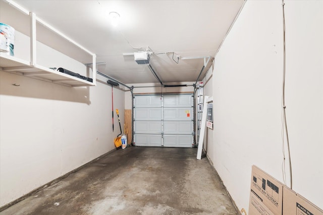 8731 Quarry Ridge Ln Unit B, Woodbury, MN 55125 - garage featuring a garage door opener