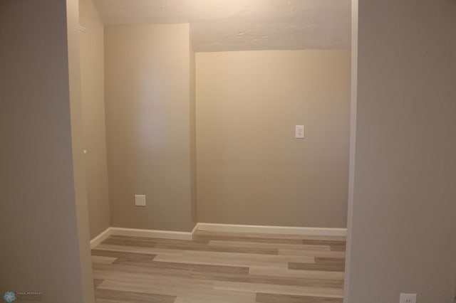 921 6th Ave N, Fargo, ND 58102 - unfurnished room featuring light wood-style floors and baseboards