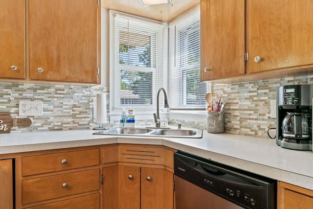 1917 2nd Ave NW, Austin, MN 55912 - kitchen with stainless steel dishwasher, light countertops, decorative backsplash, and brown cabinets