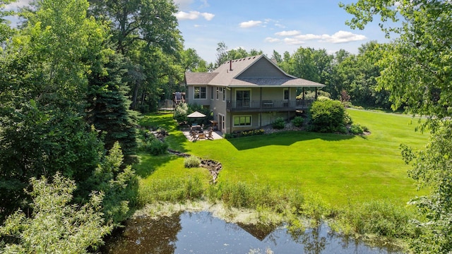 11985 Lever Ct NE, Blaine, MN 55449 - rear view of house with a yard, a patio area, and a deck with water view