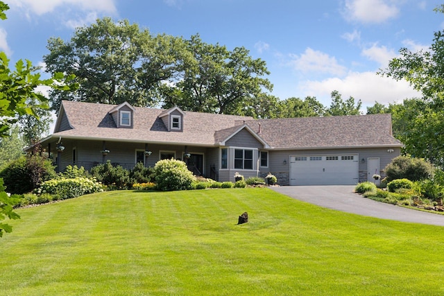 11985 Lever Ct NE, Blaine, MN 55449 - view of front facade featuring a garage, a front lawn, and driveway