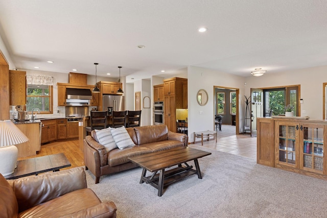 11985 Lever Ct NE, Blaine, MN 55449 - living area featuring recessed lighting, healthy amount of natural light, and light tile patterned flooring