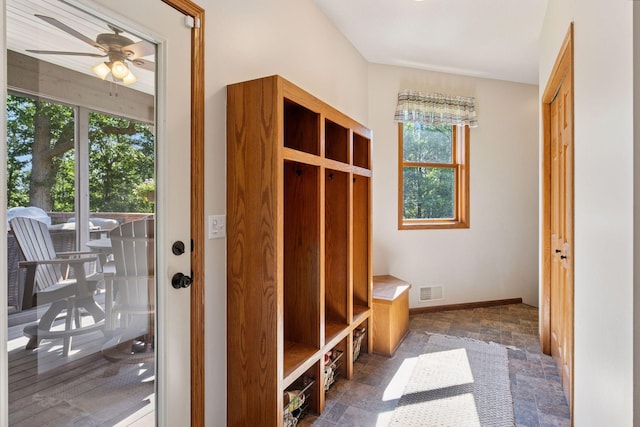 11985 Lever Ct NE, Blaine, MN 55449 - mudroom featuring a ceiling fan and dark stone finish floors
