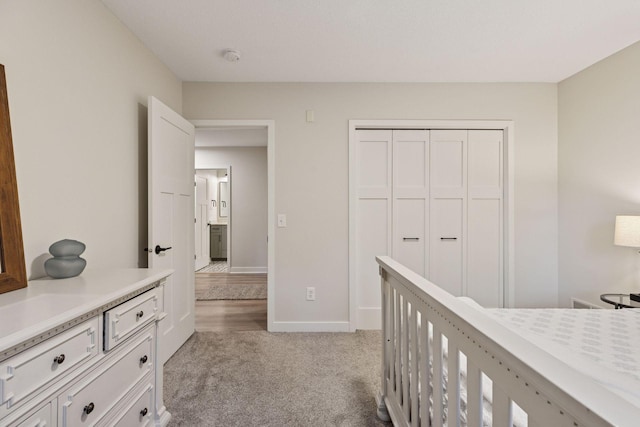 11985 Lever Ct NE, Blaine, MN 55449 - bedroom featuring light carpet and a closet