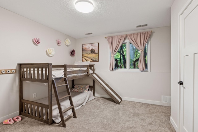 11985 Lever Ct NE, Blaine, MN 55449 - bedroom with carpet and a textured ceiling