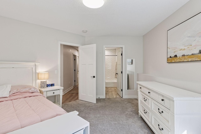 11985 Lever Ct NE, Blaine, MN 55449 - bedroom with light colored carpet and ensuite bath