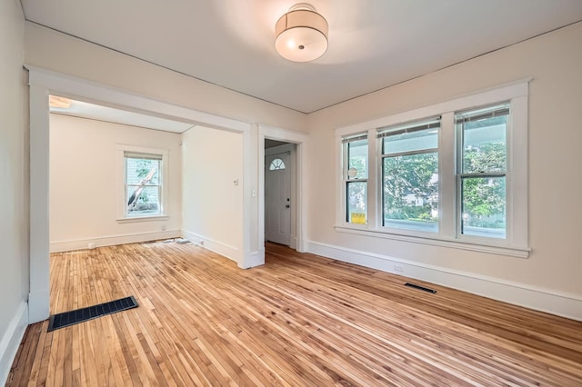 3014 Humboldt Ave N, Minneapolis, MN 55411 - empty room with baseboards and light wood finished floors