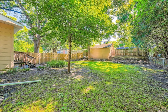 3014 Humboldt Ave N, Minneapolis, MN 55411 - fenced backyard featuring stairs