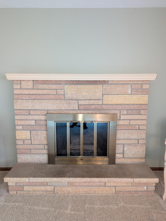 417 Ridge Rd, Albert Lea, MN 56007 - detailed view of a glass covered fireplace and carpet floors