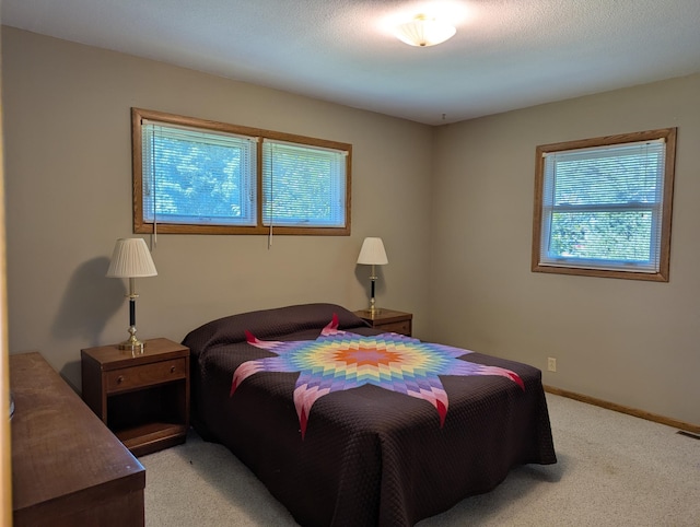 417 Ridge Rd, Albert Lea, MN 56007 - bedroom featuring light carpet and baseboards