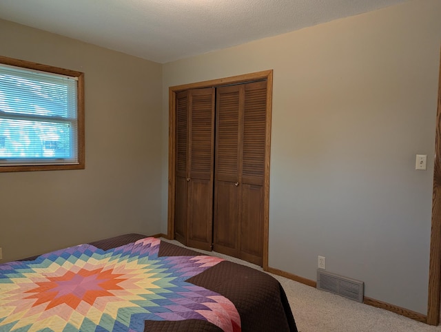 417 Ridge Rd, Albert Lea, MN 56007 - bedroom featuring a closet and light colored carpet