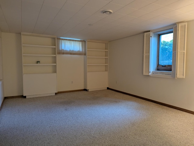 417 Ridge Rd, Albert Lea, MN 56007 - basement with baseboards and light colored carpet