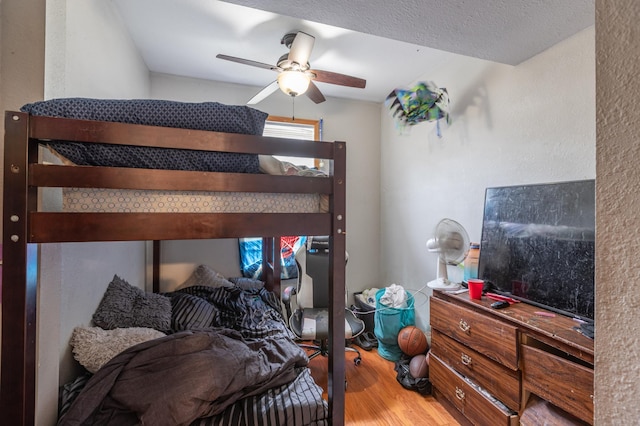 803 5th St, Winona, MN 55987 - bedroom featuring wood finished floors and ceiling fan