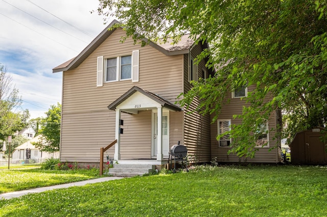803 5th St, Winona, MN 55987 - traditional-style home with a shed and a front lawn