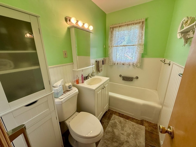 905 Clausen Ave, Albert Lea, MN 56007 - bathroom with vanity, a bath, and wainscoting