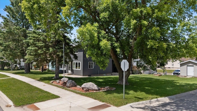 602 8th St NW, Chisholm, MN 55719 - view of front facade featuring a front yard