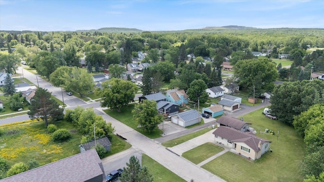 602 8th St NW, Chisholm, MN 55719 - aerial view of residential area featuring a forest