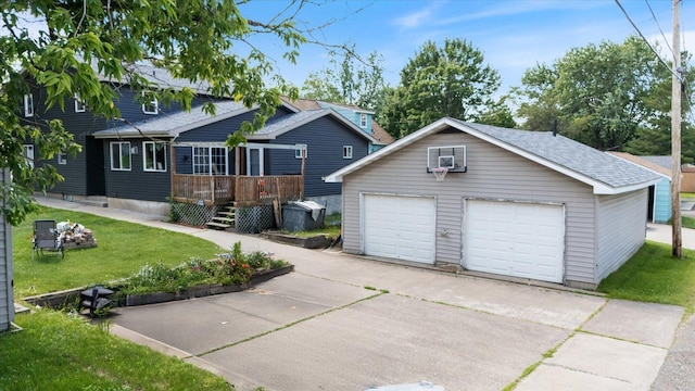 602 8th St NW, Chisholm, MN 55719 - view of front of house with an outbuilding, a front yard, a deck, a garage, and roof with shingles