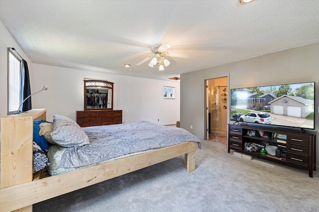602 8th St NW, Chisholm, MN 55719 - carpeted bedroom featuring a textured ceiling and a ceiling fan