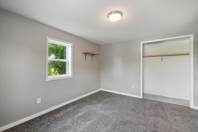 602 8th St NW, Chisholm, MN 55719 - unfurnished bedroom with carpet floors and a closet