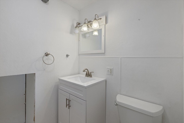 602 8th St NW, Chisholm, MN 55719 - bathroom with vanity and toilet