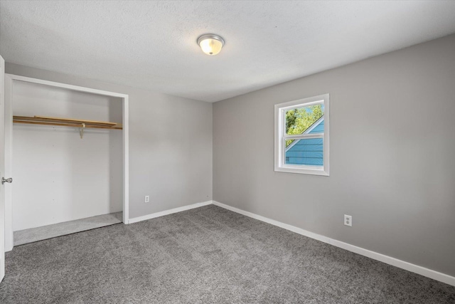 602 8th St NW, Chisholm, MN 55719 - unfurnished bedroom with carpet floors and a closet