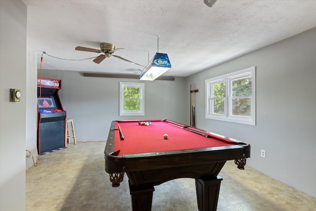 602 8th St NW, Chisholm, MN 55719 - game room with plenty of natural light, a ceiling fan, billiards table, and a textured ceiling