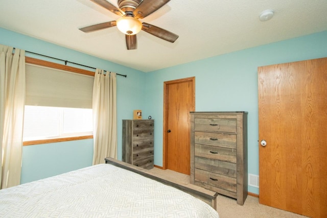 2223 Fairbanks Dr, North Mankato, MN 56003 - carpeted bedroom with a ceiling fan