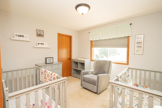 2223 Fairbanks Dr, North Mankato, MN 56003 - carpeted bedroom featuring a crib and a closet