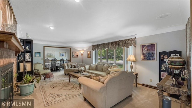 950 Tuva Rd SE, Cokato, MN 55321 - carpeted living room with a fireplace and crown molding