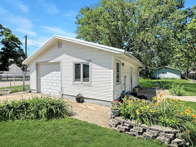 3018 Linden Ave, Slayton, MN 56172 - view of home's exterior featuring concrete driveway and a garage