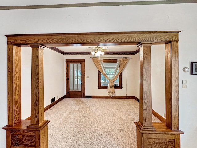 3018 Linden Ave, Slayton, MN 56172 - unfurnished living room featuring a ceiling fan and ornamental molding