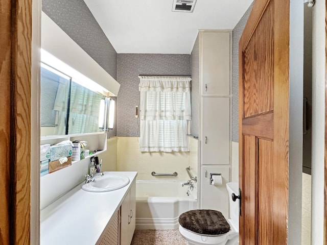3018 Linden Ave, Slayton, MN 56172 - bathroom with wallpapered walls, a garden tub, and vanity