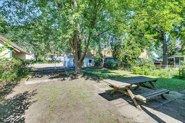 3916 37th Ave S, Minneapolis, MN 55406 - fenced backyard featuring a vegetable garden