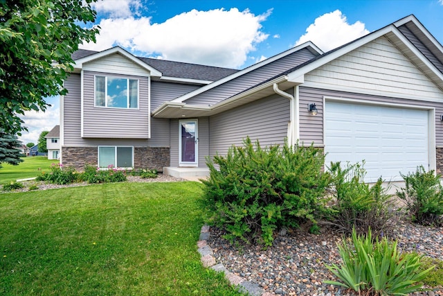 8638 Preserve Blvd N, Chisago City, MN 55013 - view of front of home featuring a garage, a front lawn, stone siding, and roof with shingles