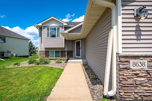 8638 Preserve Blvd N, Chisago City, MN 55013 - entrance to property featuring a yard and stone siding