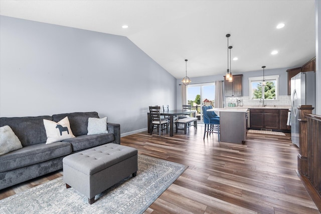 8638 Preserve Blvd N, Chisago City, MN 55013 - living room with lofted ceiling, dark wood-style floors, and recessed lighting