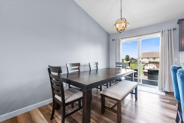 8638 Preserve Blvd N, Chisago City, MN 55013 - dining space featuring vaulted ceiling, a chandelier, and wood finished floors