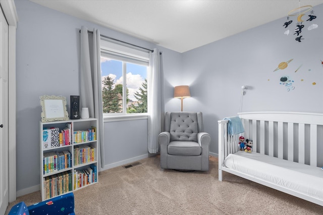 8638 Preserve Blvd N, Chisago City, MN 55013 - carpeted bedroom with a nursery area and baseboards