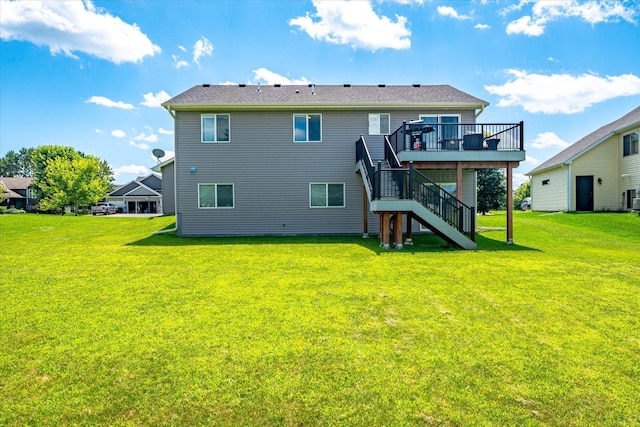 8638 Preserve Blvd N, Chisago City, MN 55013 - back of house featuring stairway, a deck, and a lawn