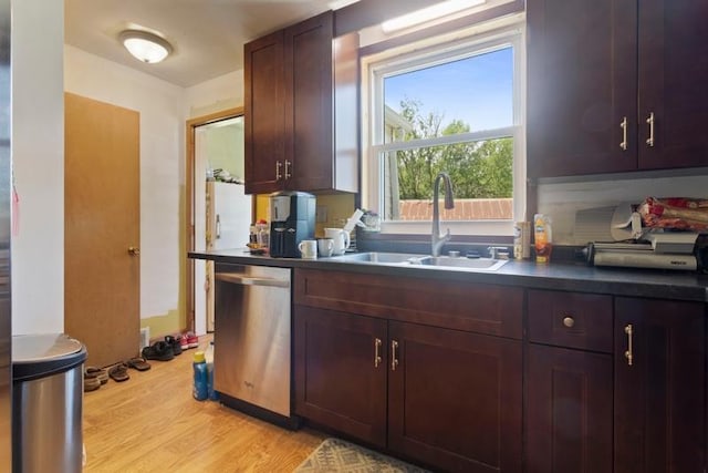322 Central Ave N, Eagle Bend, MN 56446 - kitchen with dishwasher, light wood-style floors, and dark countertops
