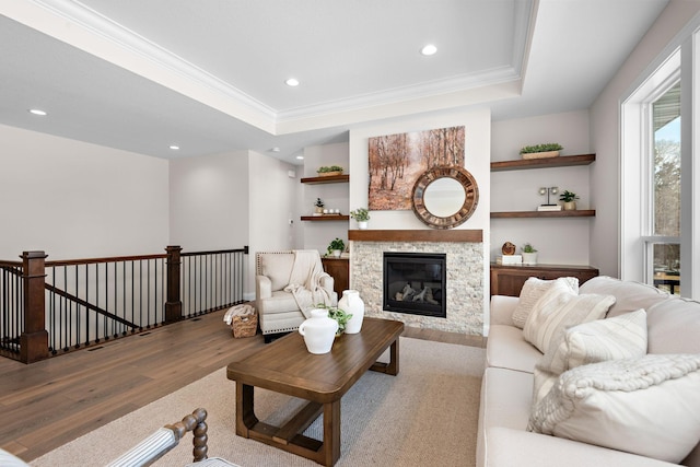 3886 Larabee Ave NE, Saint Michael, MN 55376 - living room with wood finished floors, a raised ceiling, recessed lighting, ornamental molding, and a fireplace