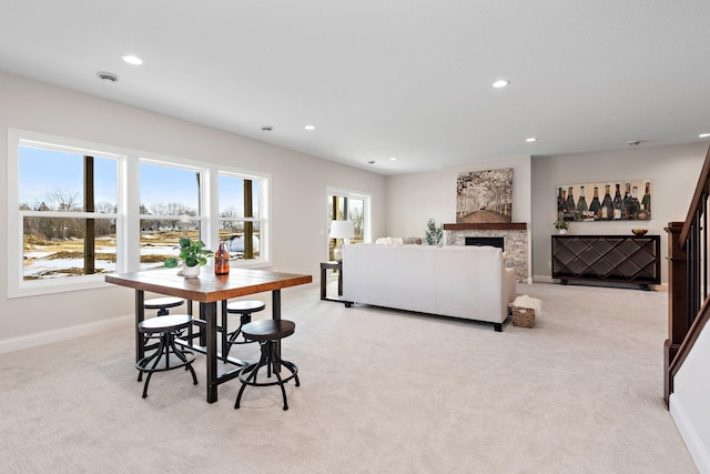 3886 Larabee Ave NE, Saint Michael, MN 55376 - dining space with recessed lighting, light carpet, and a fireplace