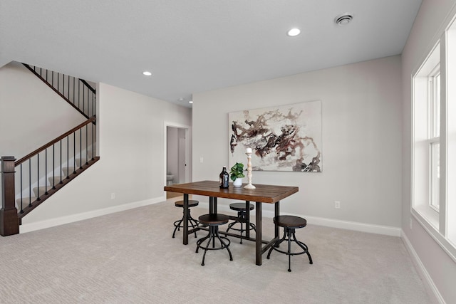 3886 Larabee Ave NE, Saint Michael, MN 55376 - dining area featuring stairs, carpet floors, and recessed lighting