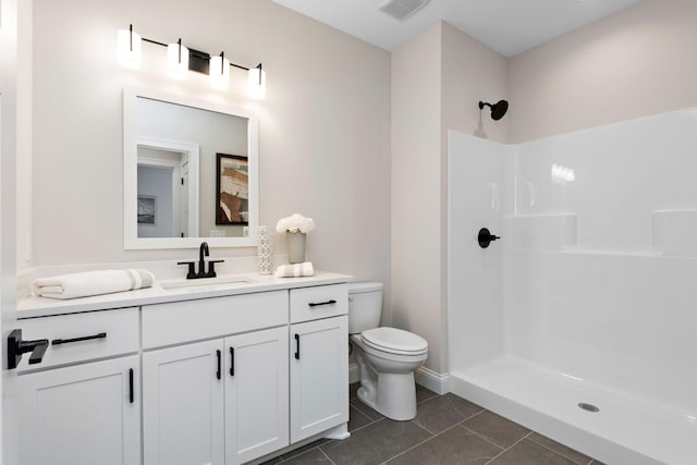 3886 Larabee Ave NE, Saint Michael, MN 55376 - bathroom with vanity, a shower, and tile patterned floors