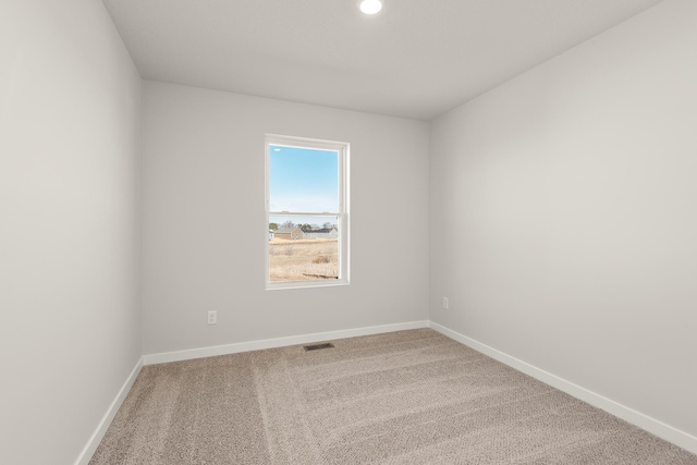 39749 Fallbrook Ave, North Branch, MN 55056 - carpeted spare room featuring baseboards and recessed lighting