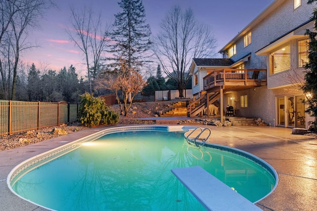 3600 Wedgewood Ln N, Plymouth, MN 55441 - view of pool featuring a patio area, a diving board, a fenced backyard, stairs, and a wooden deck