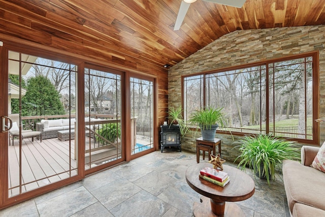 3600 Wedgewood Ln N, Plymouth, MN 55441 - sunroom / solarium with vaulted ceiling and a wood stove