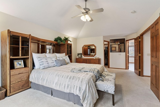 3600 Wedgewood Ln N, Plymouth, MN 55441 - bedroom with carpet floors, lofted ceiling, a walk in closet, a closet, and a ceiling fan